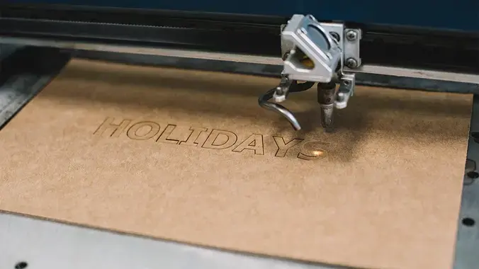Laser cutting paper, "HOLIDAYS"