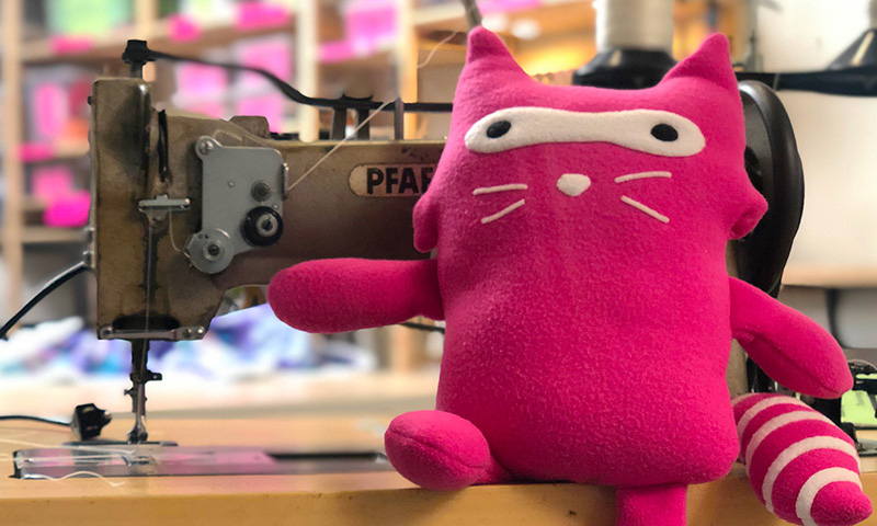 Pink plushy, heavy duty sewing machine.