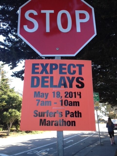 stop sign, expect delays marathon on progress sign